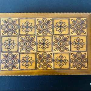 Wooden trinket box with carved floral pattern from Poland